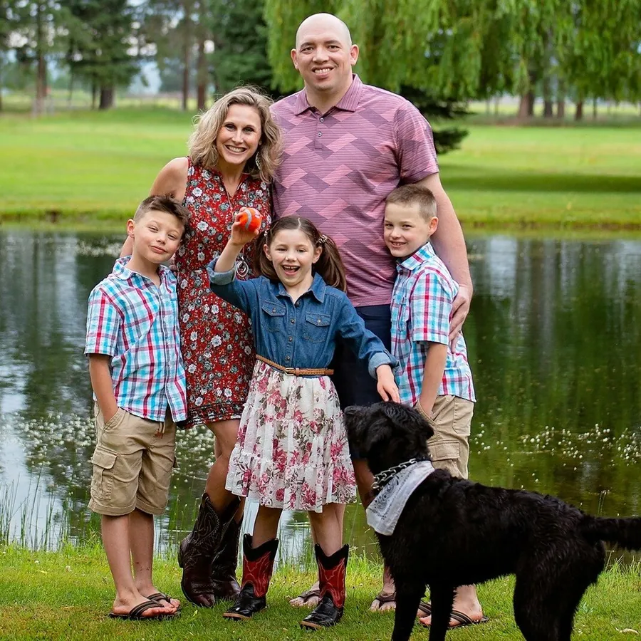 Ryan Garrison with his wife, three kids, and their dog